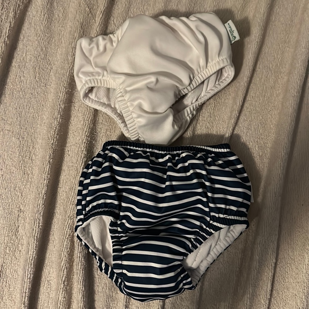 Two reusable swim diapers 6mo
